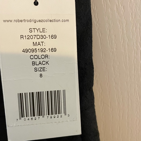 SOLD
Designer Black jacquard fabric textured Mini dress. Size 8 - Picture 3 of 4